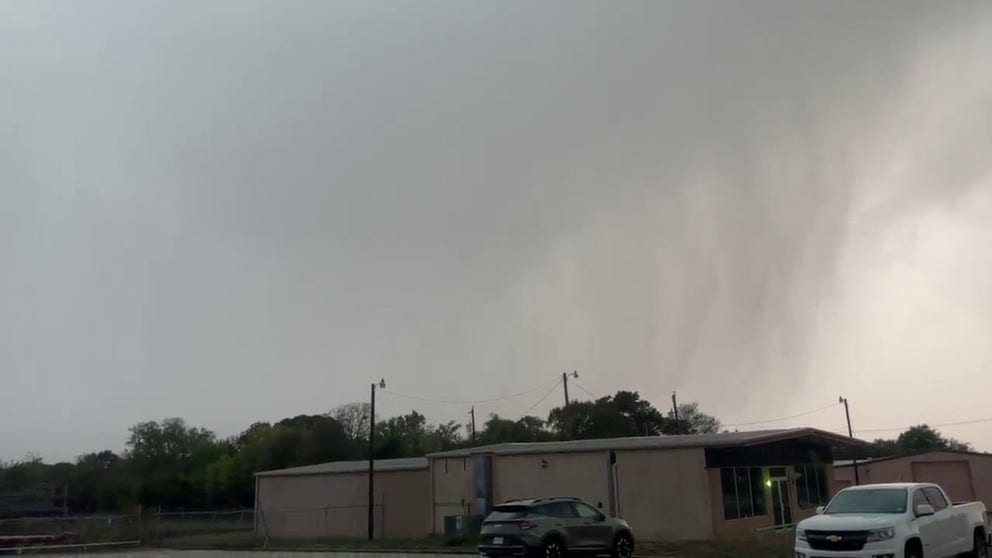 Rain-wrapped tornado spotted moving through Athens, Texas on Friday. (Credit: @millersk02/Twitter)