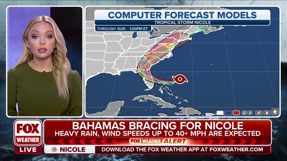 Meteorologist Kendall Smith uses spaghetti plots to show the potential paths of Nicole.
