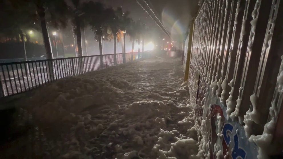 FOX Weather's Robert Ray captures sea foam littering Daytona Beach as water pushes in from Nicole. 