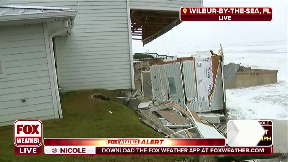 A home has collapsed into the ocean in Wilbur-By-The-Sea, Florida and several more homes are in danger of doing so due to beach erosion from Tropical Storm Nicole. 