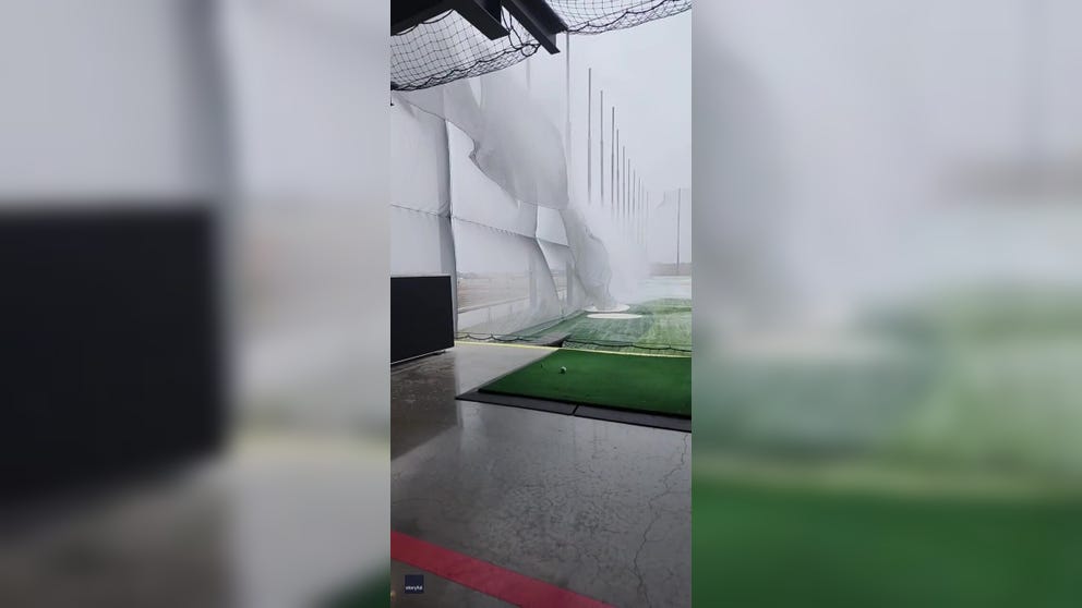 A golfer hitting the driving range got more than he bargained 'fore' after sheets of ice after a winter storm tore apart the protective netting. (Video: Alexander Gruver via Storyful)