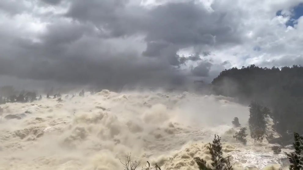 Heavy rains have sent raging waters spilling through Australia's Wyangala Ram in New South Wales. (Video courtesy: NSW RFS South West Slopes Zone via Storyful)