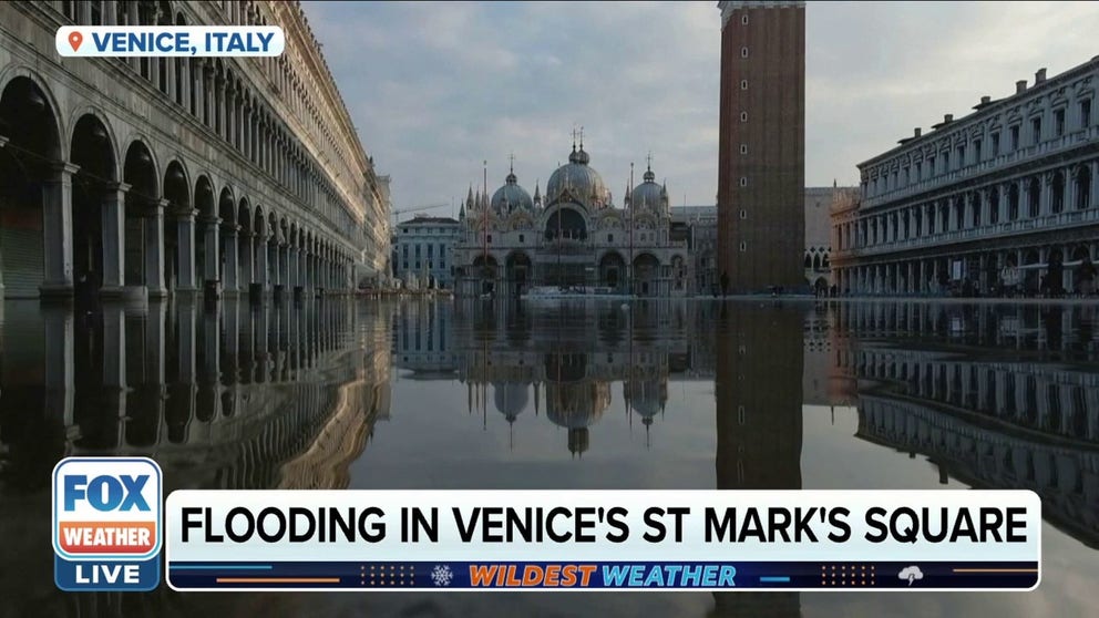 Sunny day flooding or high tide flooding filled the normally tourist-packed St. Mark's Square in Venice with water. The city put up barriers to minimize the water and to keep salt water out of the ancient basilica.