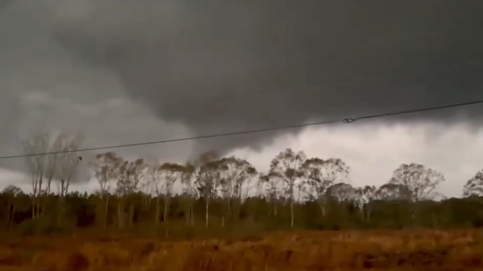 A possible tornado was spotted moving through a field in Bassfield, Mississippi, on Tuesday evening. 
