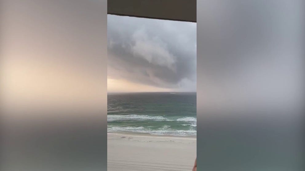 Video captures a waterspout forming in the Gulf in Panama City Beach as severe storms worked across the area.  