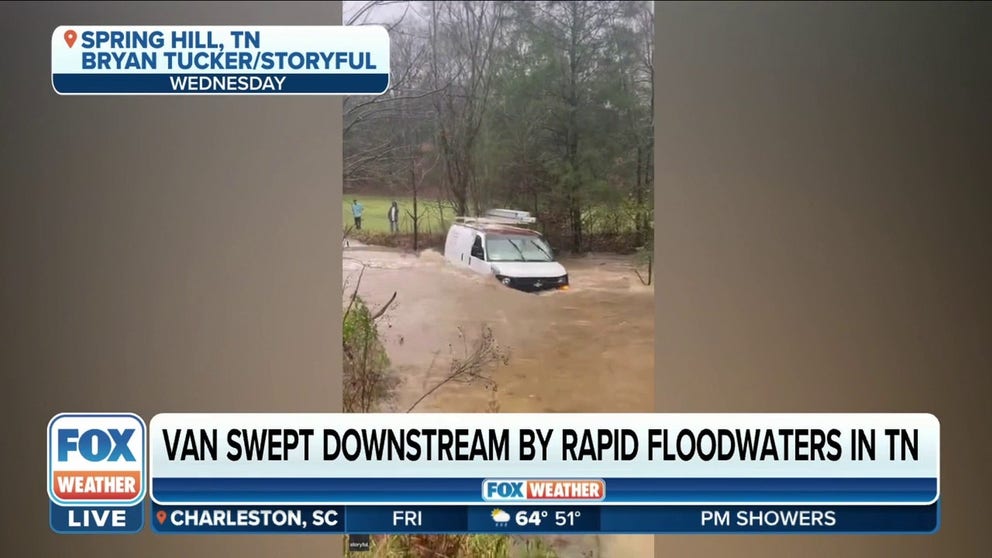 A van was swept away by raging floodwaters after a driver attempted to cross a flooded driveway in Spring Hill, Tennessee, on Wednesday.