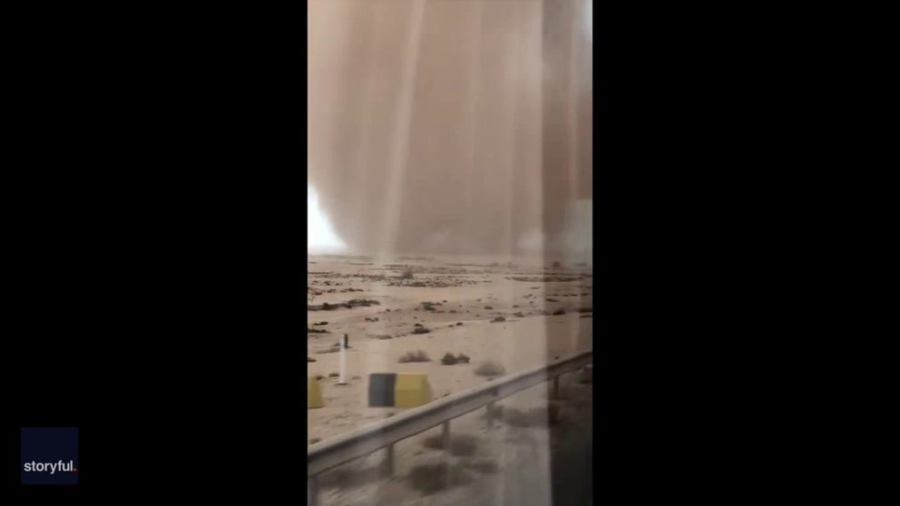 Video shows a large twister spinning through the desert of Qatar this week.