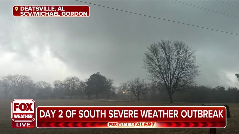 Funnel cloud emerges in Deatsville, Alabama on Tuesday on the second day of a severe weather outbreak to hit the South. 
