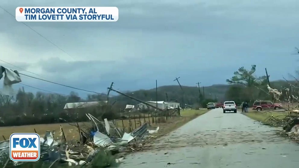 Video captures uprooted trees and debris scattered across streets in Moulton, Alabama after a tornado-warned storm. The Morgan County Sheriff’s Office has reported injuries. (Credit: Tim Lovett via Storyful)