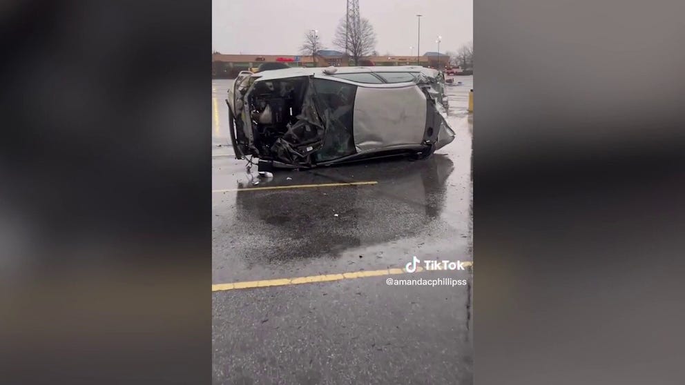 Cars and trucks experienced extensive storm damage in the Wal-Mart parking lot in Griffin, Georgia. Severe weather swept through the South on January 12, 2023. (Courtesy: @amandacphillipss / TikTok)