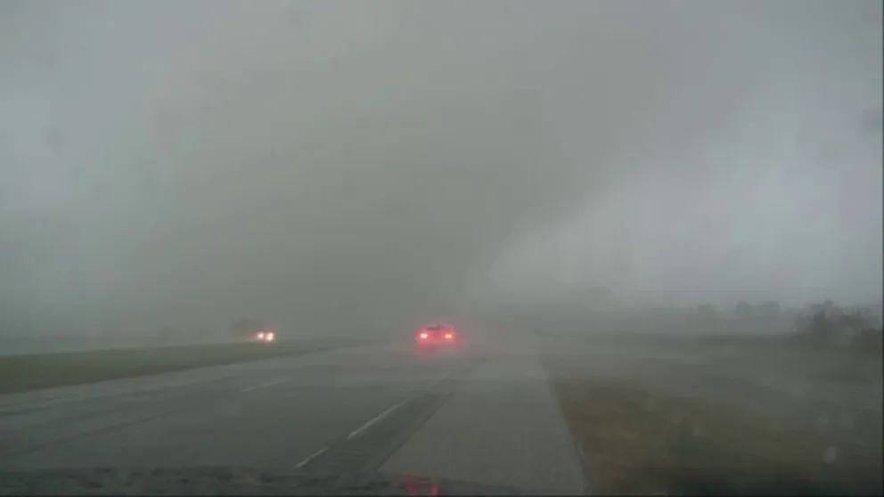 Storm chaser captures a tornado rolling across Highway 73 in Taylor Landing, Texas. (Credit: Brad Arnold, LSM)