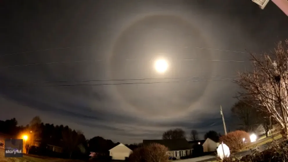 Those sky gazing Saturday evening around Kentucky were treated to an unusual sight among the heavens: A colorful rainbow-esque halo surrounding the moon. (Video: Johnnie Nicholson via Storyful)