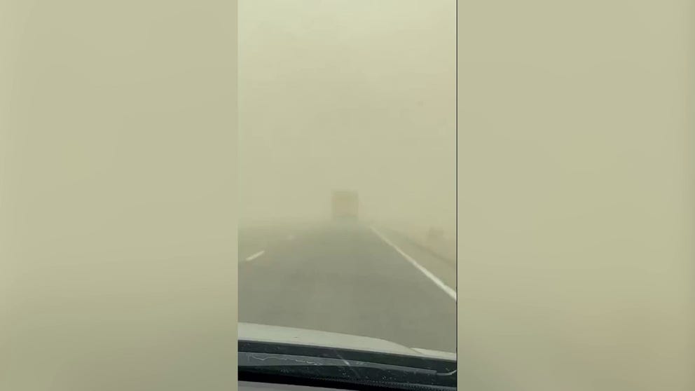 An Oklahoma Highway Patrol Trooper took video on the way to a deadly 10-car pileup. Winds gusting over 80 mph stirred up dust that made the ambulance he was following nearly impossible to see.