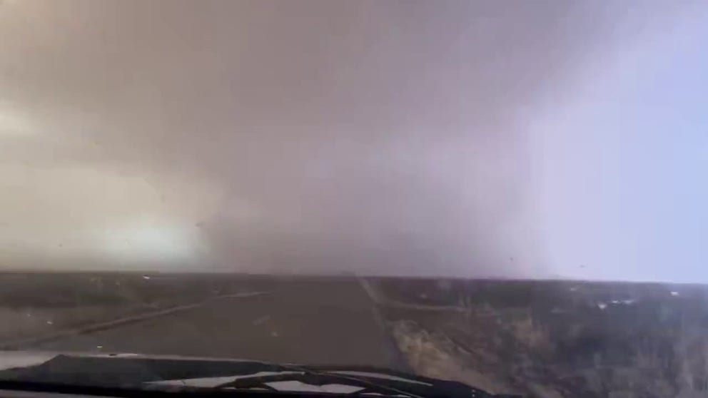 Two storm chasers had to stop their car when they came upon this amazing lightning show. The chasers say this was a downdraft or microburst near Sublette, Kansas around 5 p.m. (Video courtesy: @JakeSlyveon)