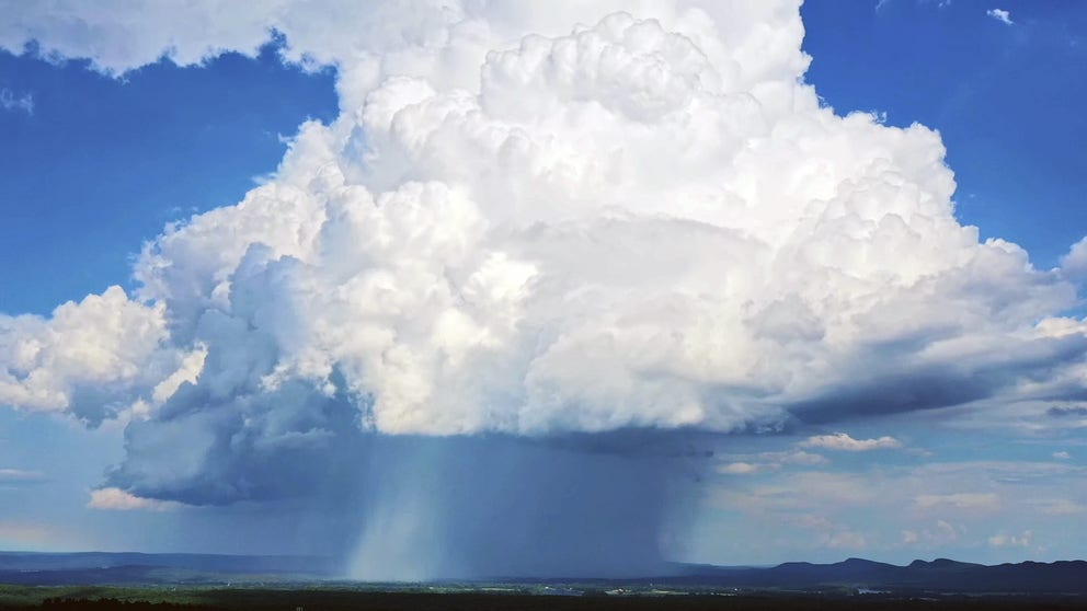 Like an atmospheric water balloon, a microburst is an incredible downdraft that spills forth from the belly of thunderstorms. 
