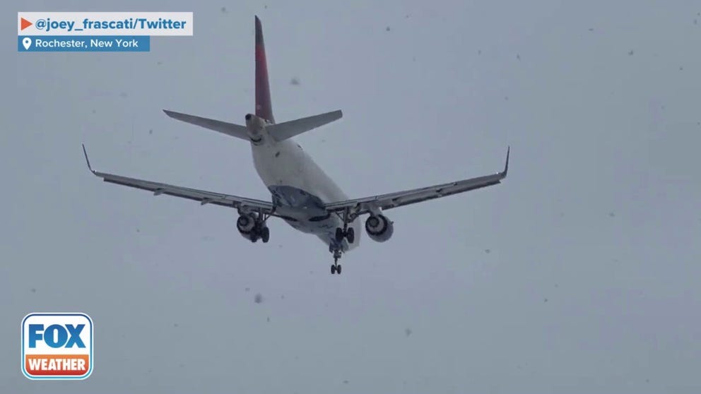 A Delta Airlines plane from Boston made a scary landing in Rochester, New York in windy and snowy conditions from a nor'easter. (Credit: @joey_frascati/Twitter)