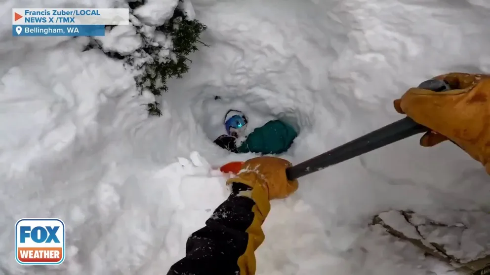 Dramatic video captured the moments a skier saved a snowboarder who became buried in feet of snow in the Baker Ski Area of Bellingham, Washington. (Credit: Francis Zuber/LOCAL NEWS X /TMX)