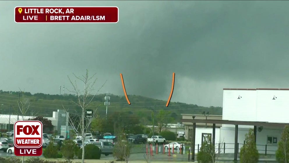 Storm tracker Brett Adair spotted a possible tornado moving through Little Rock, Arkansas. 