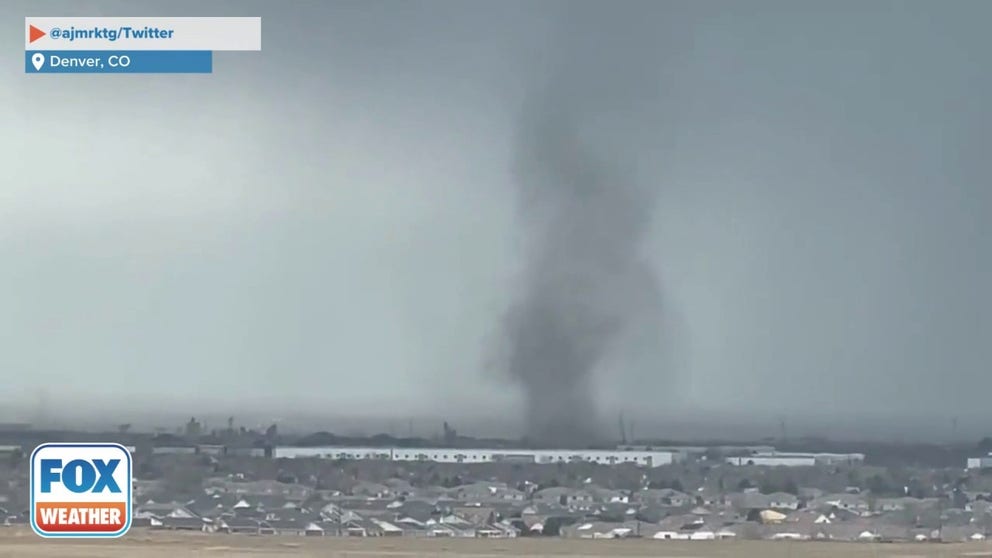 Landspout caught on video in Denver, Colorado on Tuesday. A Winter Weather Watch is in place for the area. (Credit: @ajmrktg/Twitter)