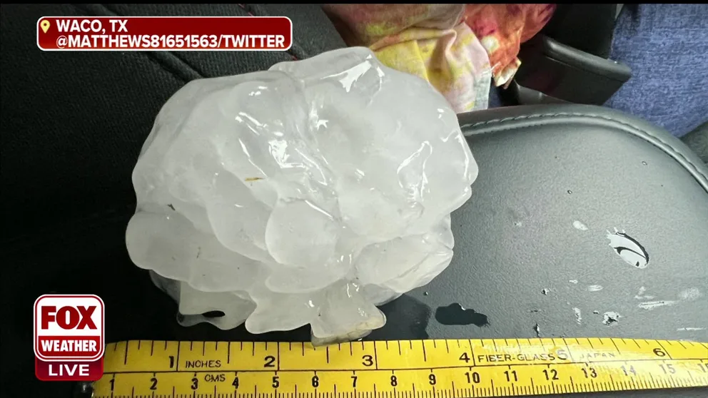 Grapefruit-sized hail falls from the sky in Waco, Texas on Wednesday. The hail was measured at 4 inches in diameter. 