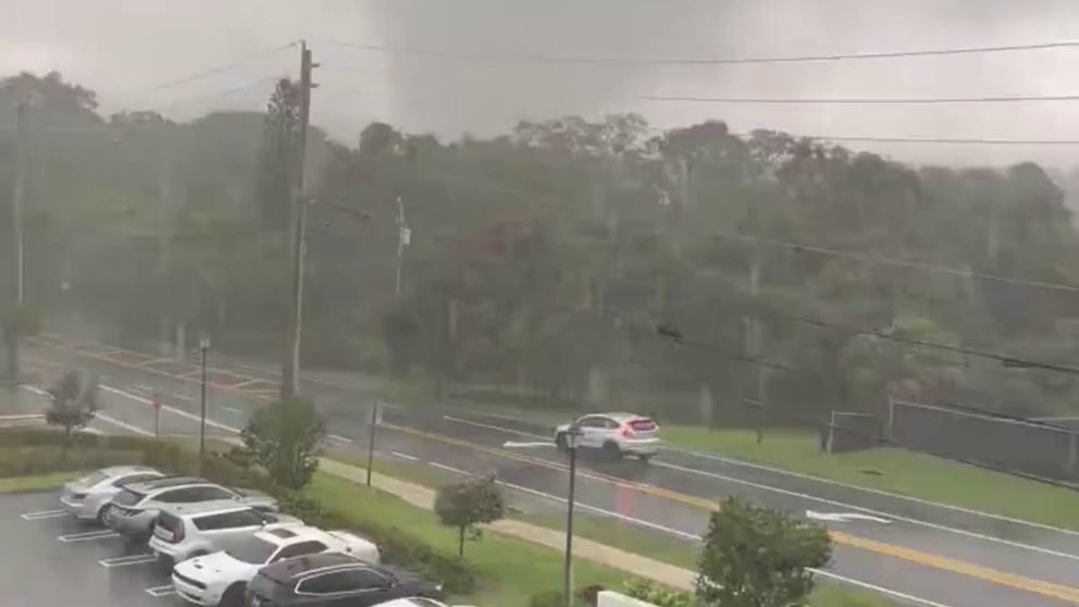 Caught on video: Tornado rolls through South Florida | Latest Weather ...