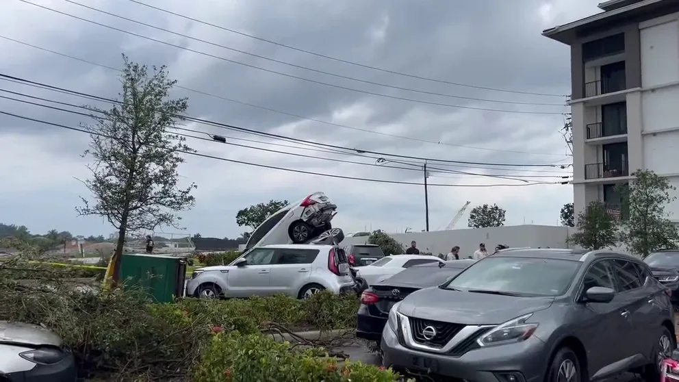 An EF-1 tornado touched down in Palm Beach Gardens, Florida, on Saturday, and video recorded by Lauren Kreidler shows damage left behind after the twister tore through the community.