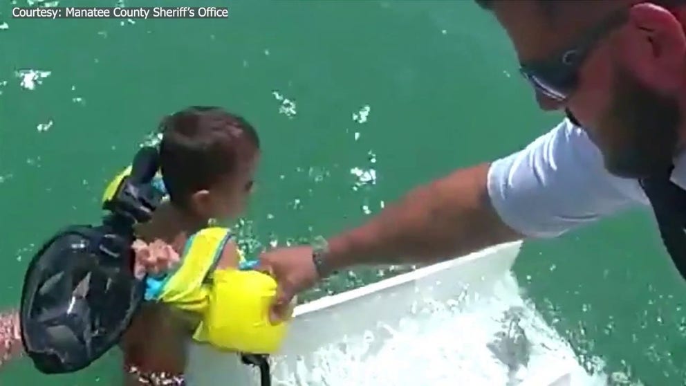 A father and his young son vacationing in Florida were rescued after they were pulled 100 yards offshore by a powerful rip current in Florida over the weekend.