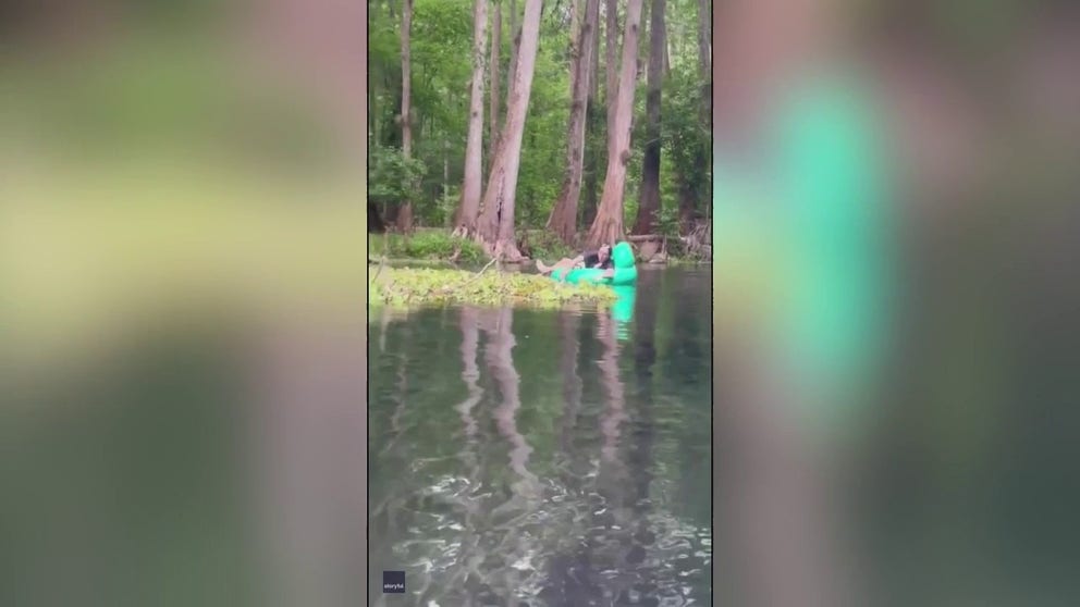 Three women floating down Ichetucknee River on inflatable tubes near Fort White, Florida, had a close encounter with an alligator on Friday, May 5.