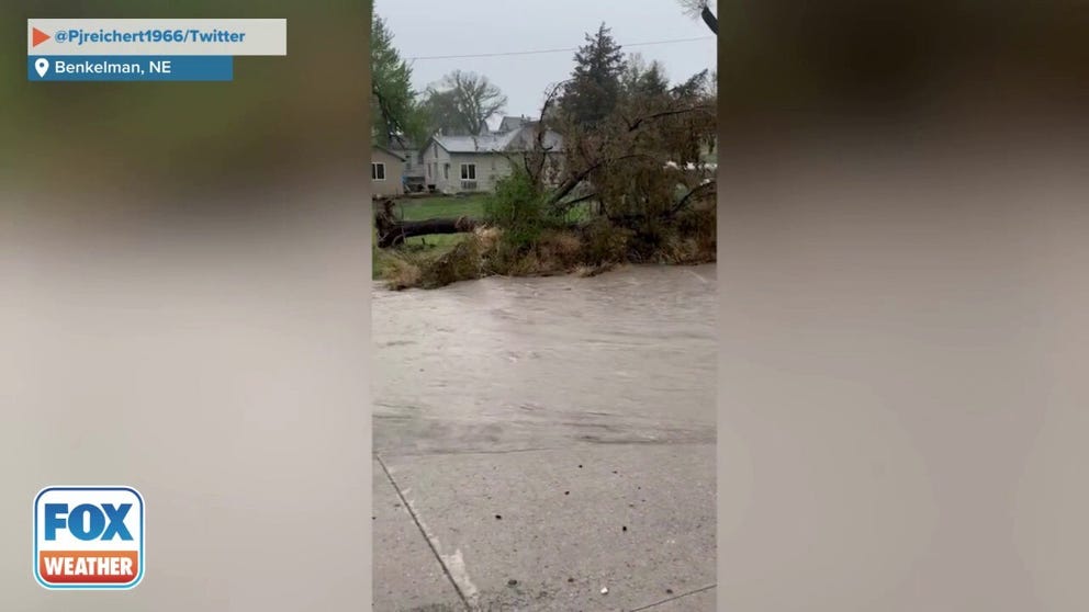 Flash flooding occurs in Benkelman, Nebraska on Thursday afternoon as storms roll through the Plains. (Credit: @Pjreichert1966/Twitter)