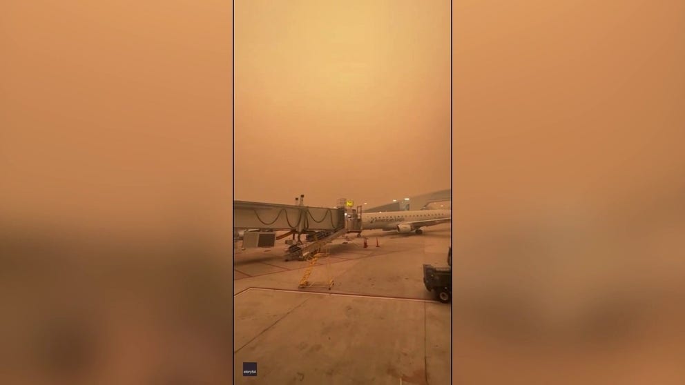 A pilot who was due to fly out of New York’s LaGuardia Airport on June 7 recorded video showing the surreal orange haze encompassing the facility.