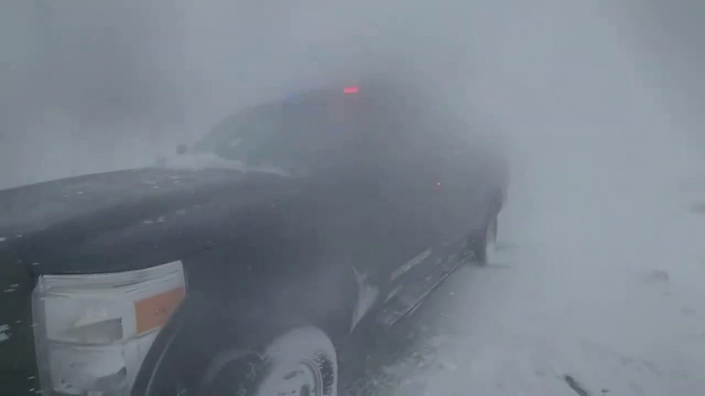 Blizzard conditions on Colorado’s Pikes Peak near Colorado Springs caused whiteout conditions and forced evacuations on Monday.