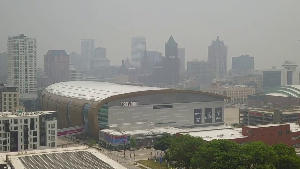 Aerial video shows the hazy conditions in downtown Milwaukee on Tuesday as Canadian wildfire smoke blanketed the city. 