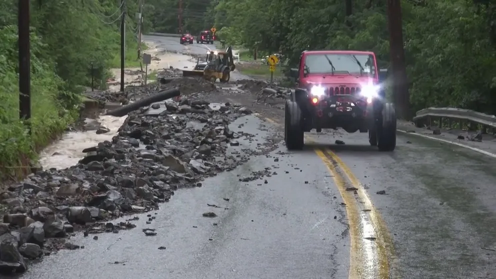 Video recorded in Orange County, New York, shows rocks and debris covering roads after deadly and historic flooding on Sunday, July 9, 2023.