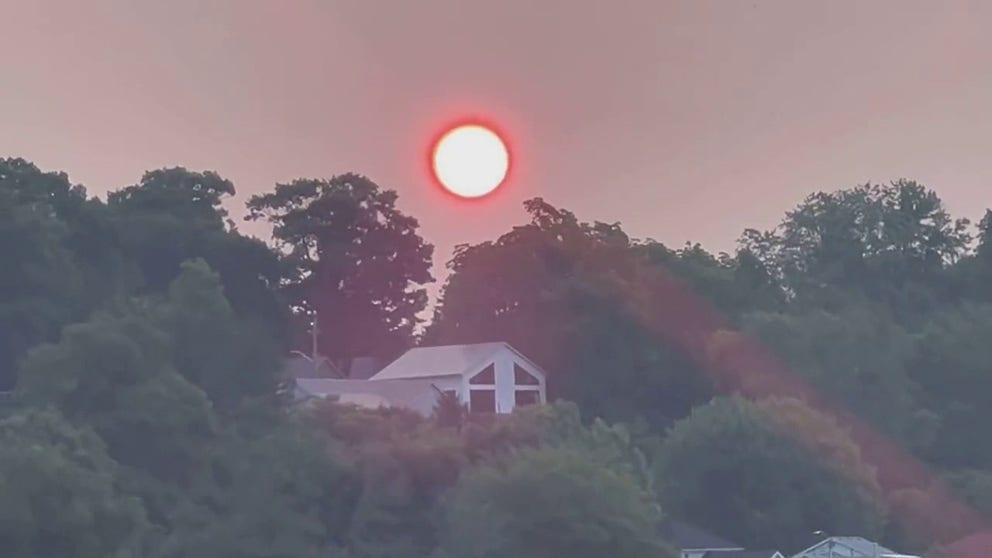 Smoke from wildfires burning in Canada led to a beautiful, hazy sunrise above Ontario's Lake Erie on Monday, July 17, 2023.
