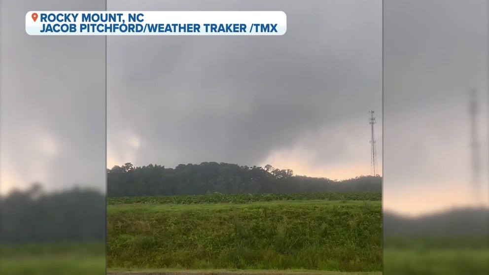 This video shows a large and dangerous tornado moving through Nash County, North Carolina on July 19, 2023 wiping trees and debris up. (Video: Jacob Pitchford/TMX)