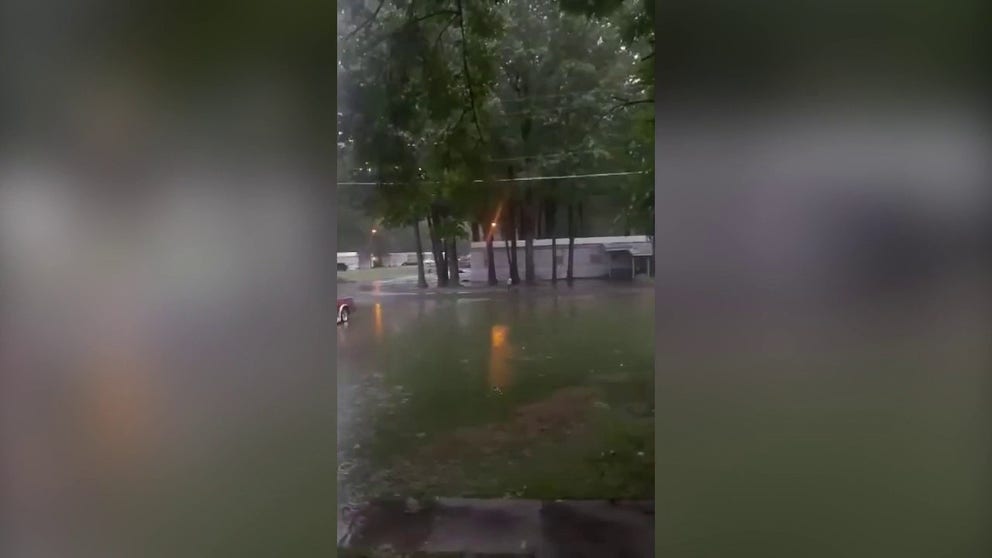 Heavy rain triggered flash flooding in parts of western Kentucky early on Wednesday, July 19, 2023. Footage filmed by Jeff Kent shows floodwaters in the Oakdale neighborhood of Paducah.