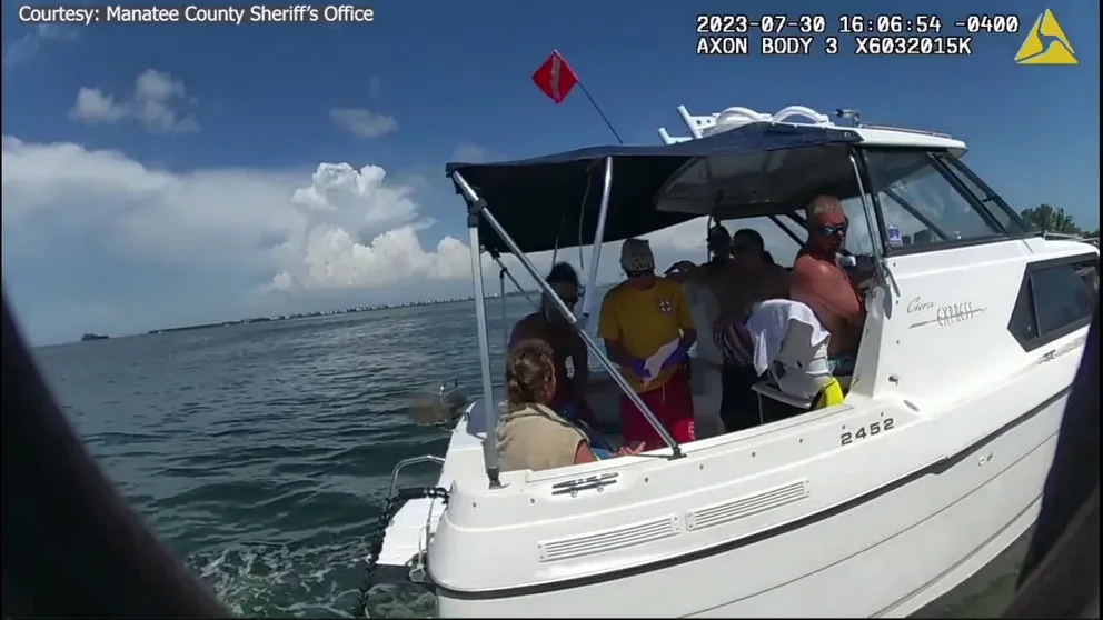 Bodycam footage from the Manatee County Sheriff's Office shows deputies helping a man who was bit by a shark off Anna Maria Island.