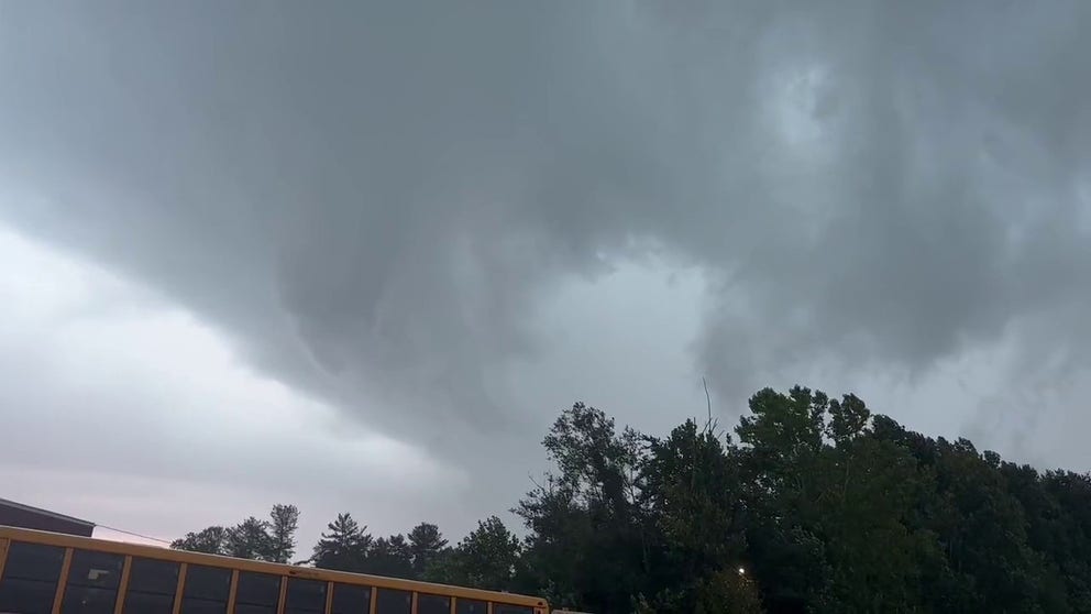 Residents nervously eye a rotating cloud over Gamewell, North Carolina generating lightning and thunder.