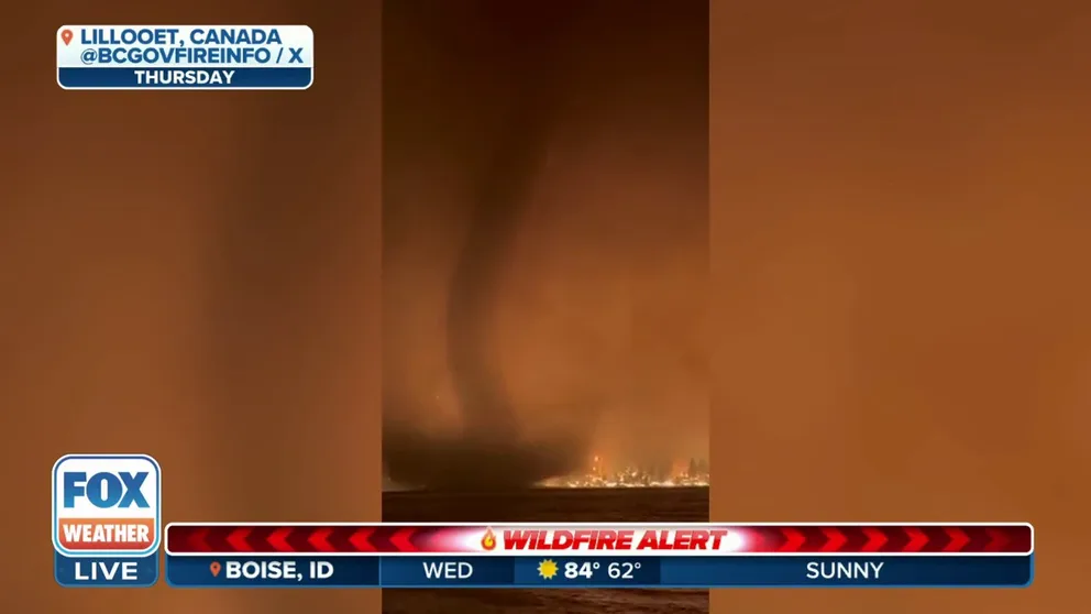 Dramatic video showed what the FOX Weather Center believes was a waterspout spinning across the water in British Columbia, Canada last week while a massive wildfire scorched the landscape in the background.