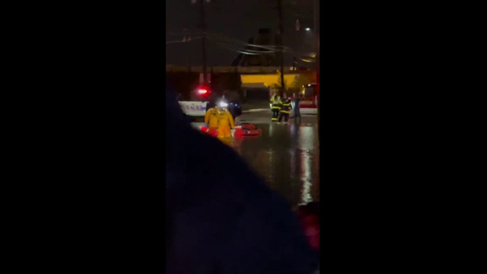 Video shows first responders rescuing drivers and residents after flash flooding was reported in Parma, Ohio on Wednesday night.