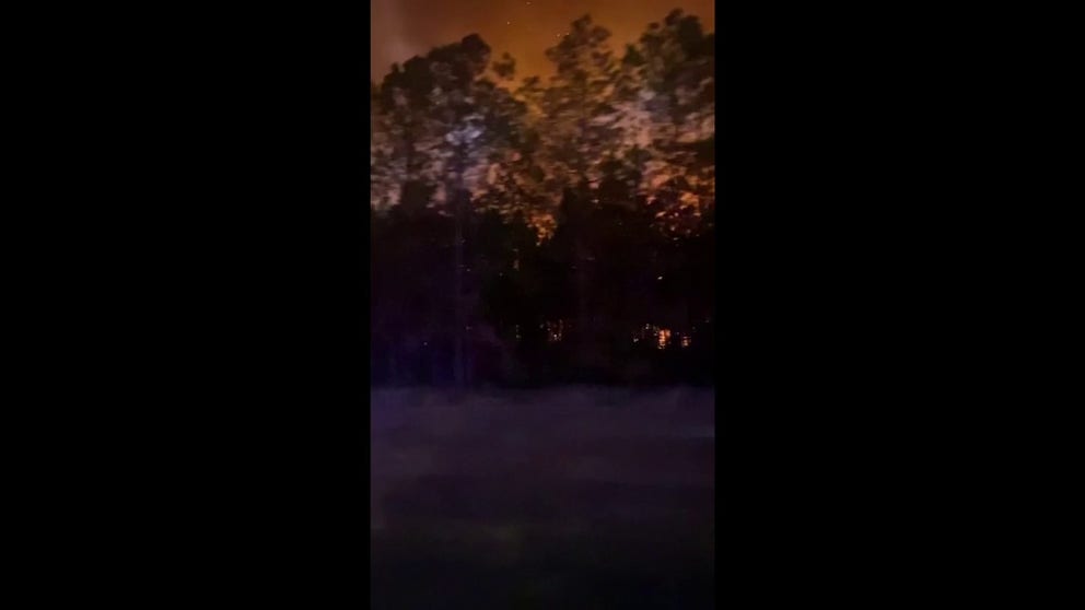 Beauregard Parish, Louisiana officials issued a mandatory evacuation for Merryville. The 12,000 acre fire near the Texas border had been 85% contained. Firefighters caught glimpses of the blaze through the trees while driving to the command center.