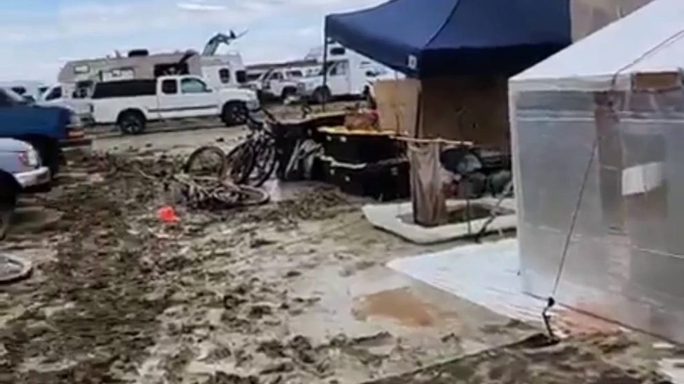 Thousands of attendees at the annual Burning Man festival in Nevada are dealing with monsoon downpours and a muddy mess.