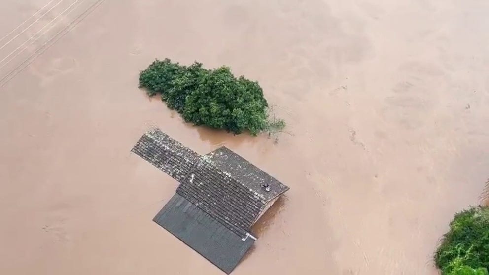This footage was posted to Twitter by the military police in Rio Grande do Sul, shows them rescuing a family of six from the roof of a house in Arroio de Meio near the Taquari River in Brazil.  Credit: Brigada Militar-RS via Storyful