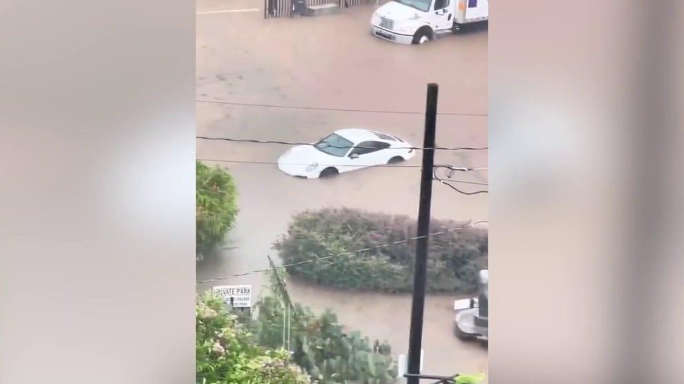 Video shot in downtown Atlanta shows a parking lot turned into a small lake. Around 2 inches of rain fell in the area in less than two hours, according to the FOX Forecast center. (Courtesy: @JToddGeorge / X)