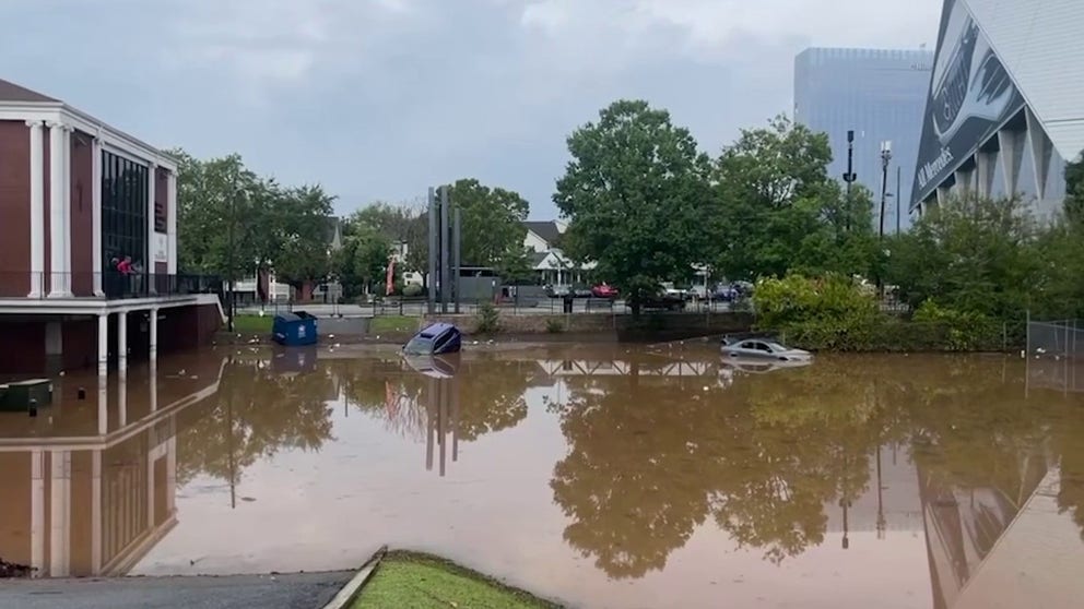 This video shows a flooded parking lot, where witnesses say vehicles were swept into by floodwater. Sept. 14, 2023. (Courtesy: Megan Varner)
