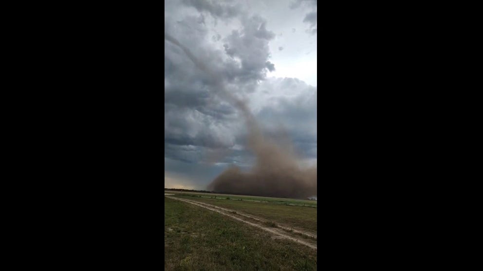 A landspout was seen moving through Nekoma, Kansas, on Tuesday evening. The Plains were under a severe weather threat through late Tuesday. 