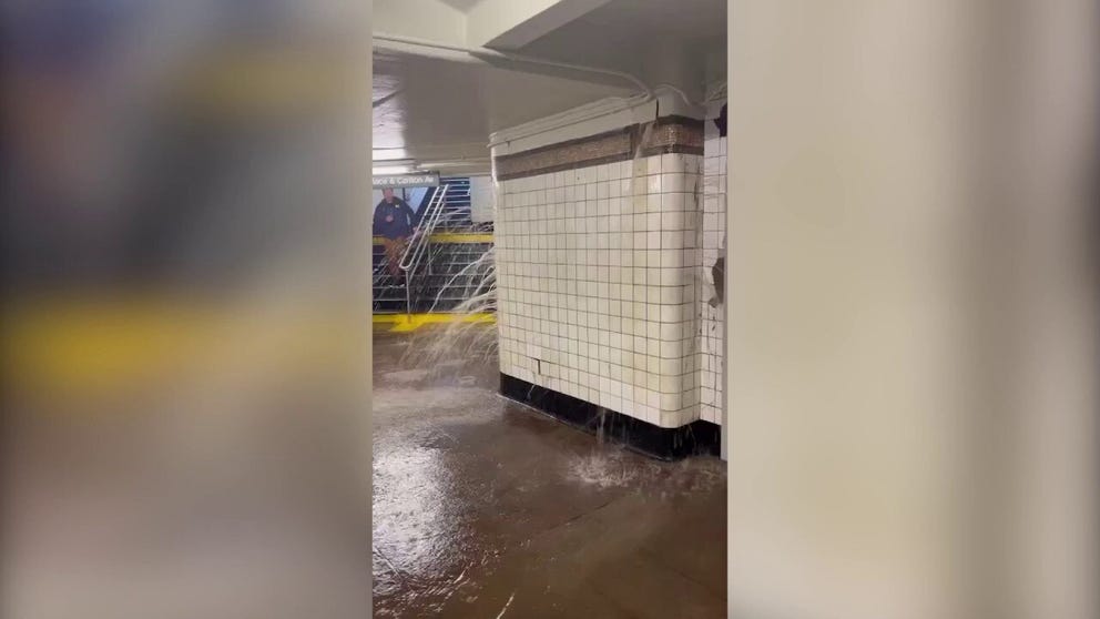 Rainwater flooded the B/Q 7th Avenue subway station in Brooklyn as torrential downpours caused flash flooding across New York City on Friday morning.