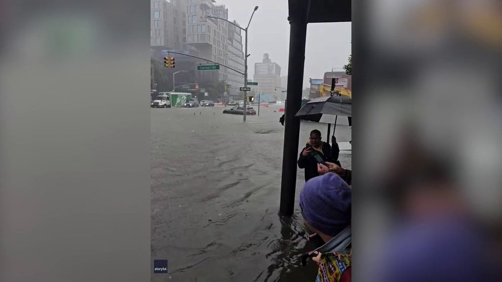 Video by Phuong Van Huynh shows a whirlpool forming above a storm drain on Brooklyn’s 4th Avenue, as floodwater engulfed cars and brought traffic to a crawl.