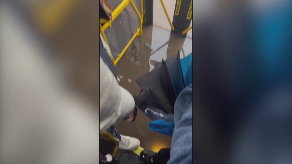 Passengers on a Brooklyn bus began to panic and put their feet up on the seats as floodwaters caused by torrential downpours began to seep through the doors on Friday, September 29. (Video: Adrian Franks via Storyful)