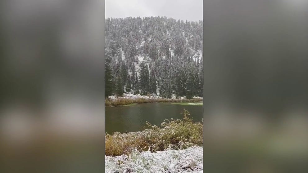 Ski resort operators in Utah rejoiced as snow blanketed mountains at Lake Solitude in the Big Cottonwood Canyon on Monday.